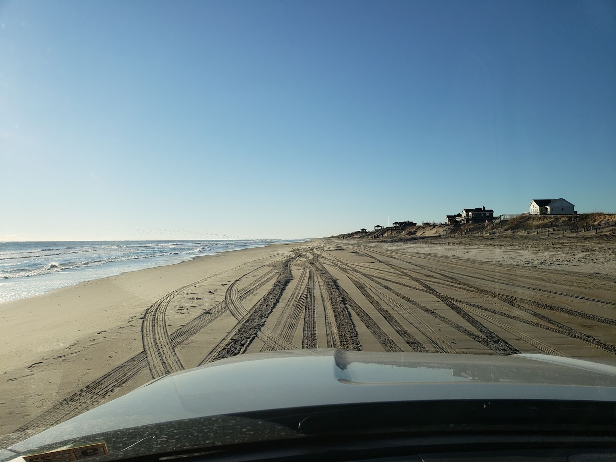 Tire tracks on Carova beach showing the driving path